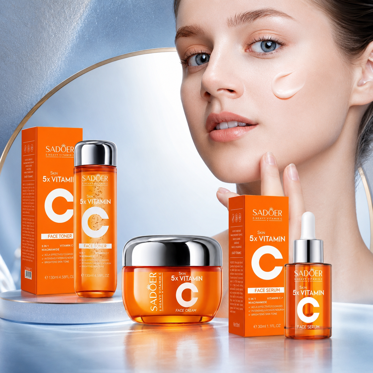 Vitamin C Skincare Essentials on a midnight navy and icy-blue studio backdrop